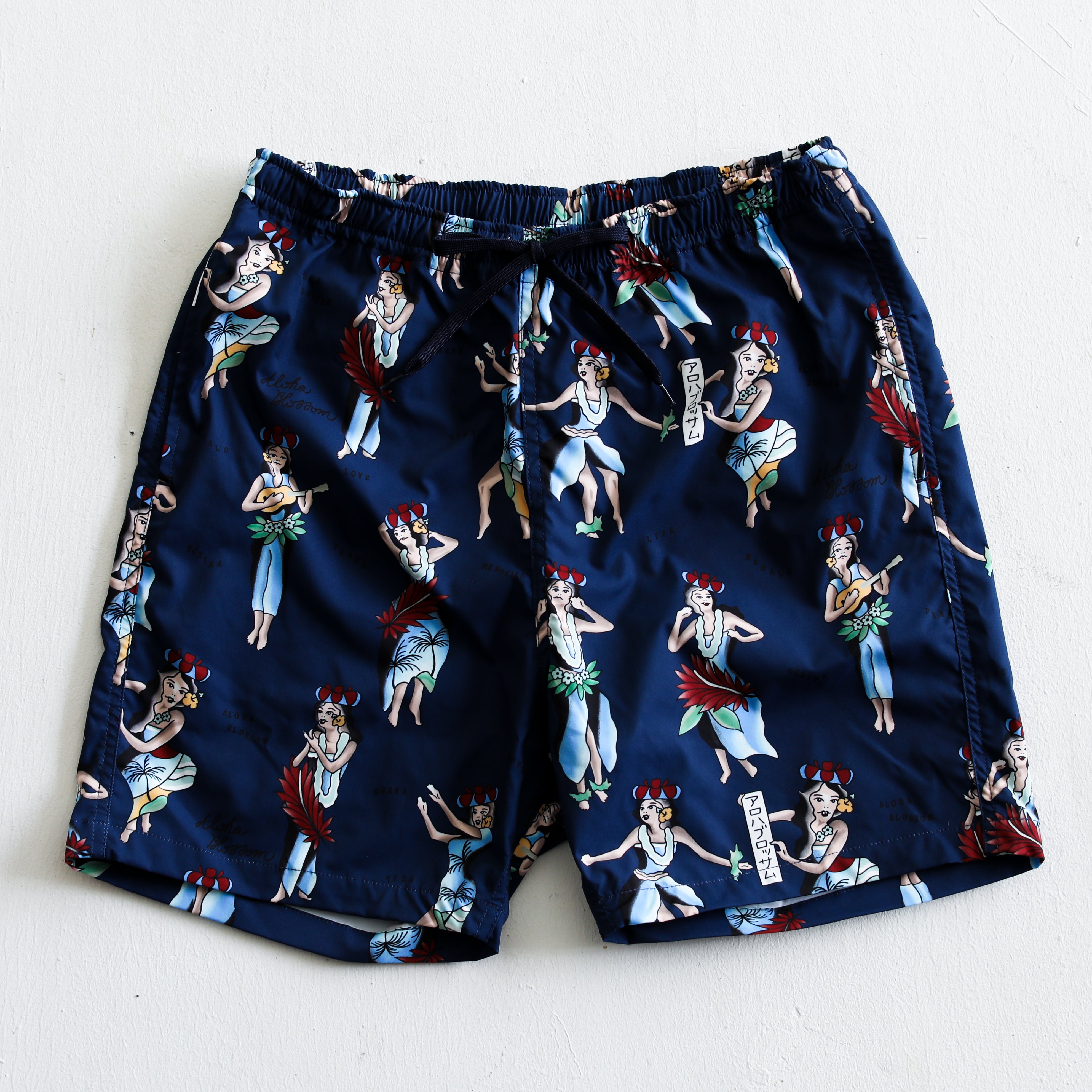 Aloha Blossom × SHIGIRA SEVEN MILES RESORT HULA GIRL BEACH SHORTS