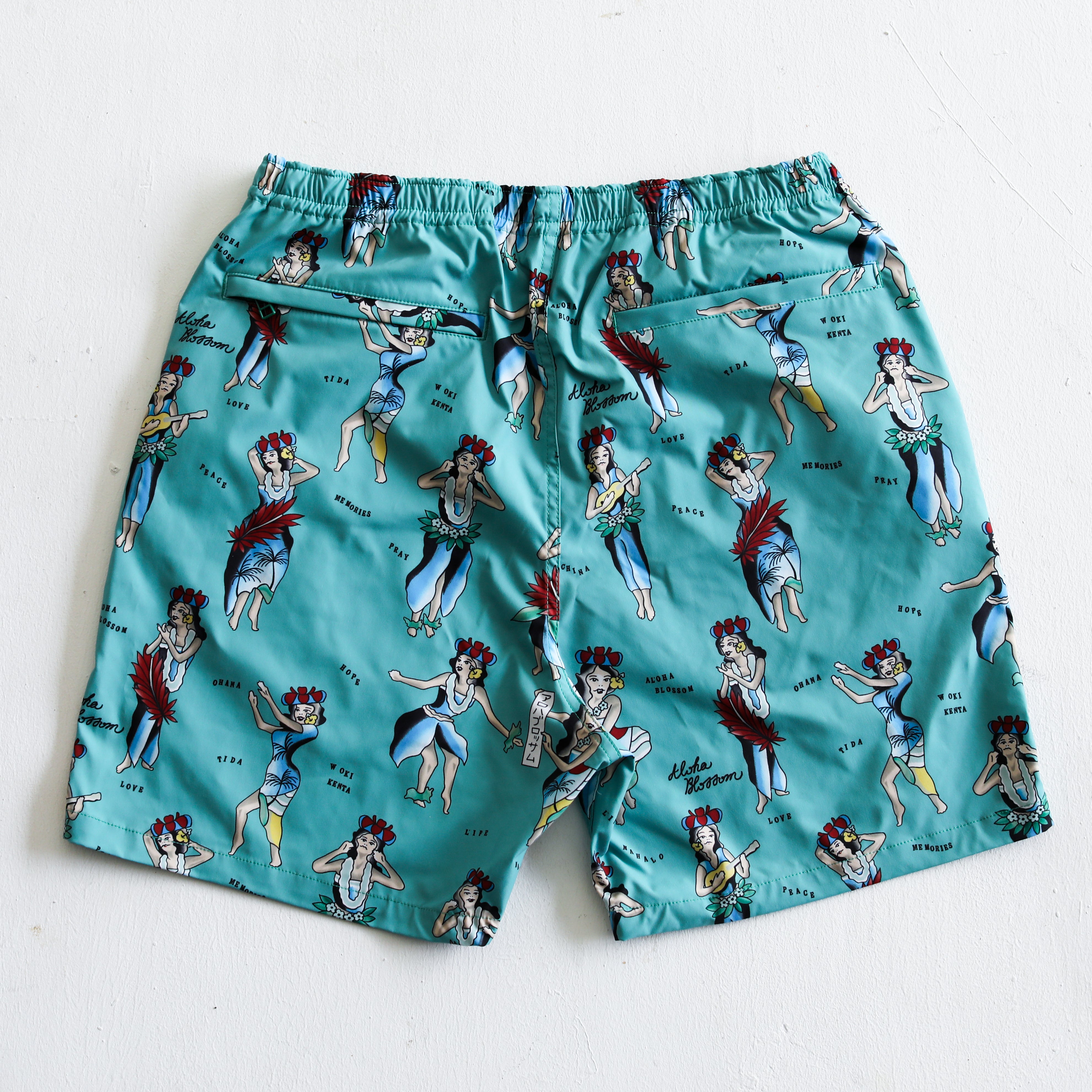 Aloha Blossom × SHIGIRA SEVEN MILES RESORT HULA GIRL BEACH SHORTS