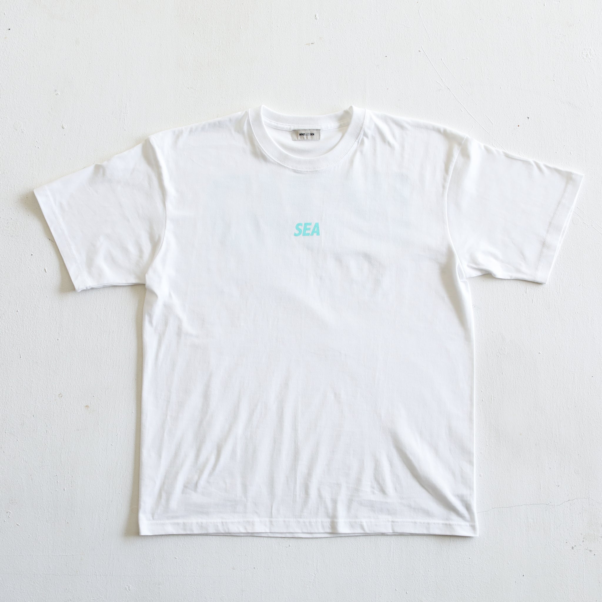WINDANDSEA × SHIGIRA SEVEN MILES RESORT Back Print T-Shirts